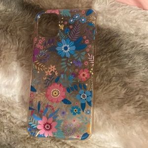 iPhone 11 phone case. Flowers and leaves printed on. Sparkle dots on case